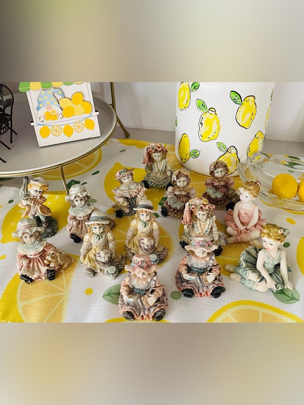 Collection of 14 Porcelain Figurines in Pastel Colors